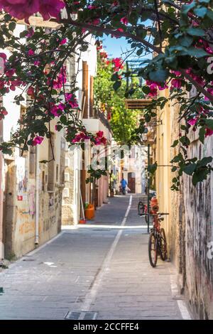 Historic streets with colorful flowers in the old town of Rethymno, North Crete, Greece Stock Photo