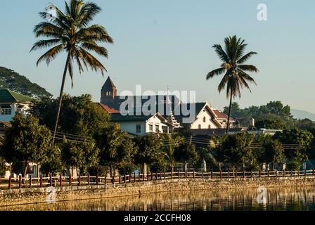 On Naung Toung Lake, Kengtung, Shan State, Myanmar (Burma). Shan Baptist Church is visible in the distance. Stock Photo