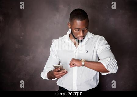 african stock photo of black gentlemen in smart clothes in studio setting Stock Photo