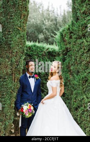 Wedding, newlyweds, young adults, diversity, love, garden Stock Photo