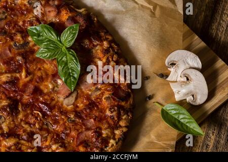Fresh baked italian pizza with ingredients Stock Photo