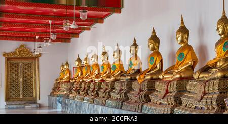 Gilded Buddha statues (Bhumispara-mudra: Buddha Gautama at the moment of enlightenment), Wat Pho, Bangkok, Thailand, Asia Stock Photo