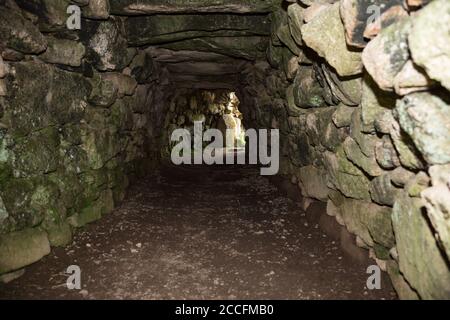 Tunnel at Carn Euny archaelogical site on the Penwith peninsula in Cornwall, UK Stock Photo