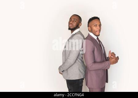 african stock photo of black gentlemen in smart clothes in studio setting Stock Photo