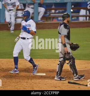 Los Angeles, United States. 21st Aug, 2020. Los Angeles Dodgers' Chris Taylor scores on the sacrifice fly by Austin Barnes in the sixth inning against the Colorado Rockies at Dodger Stadium in Los Angeles on Friday, August 21, 2020. Photo by Jim Ruymen/UPI Credit: UPI/Alamy Live News Stock Photo