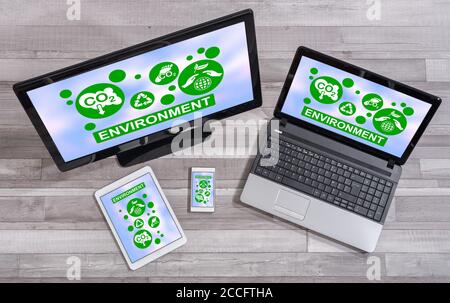 Environment concept shown on different information technology devices Stock Photo