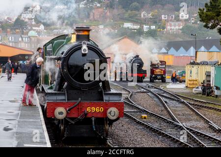 Ex-GWR steam loco 6960 'Raveningham Hall' waits to depart from Minehead station, West Somerset Railway Spring Gala, England, UK Stock Photo