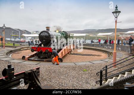 Ex-GWR steam loco 6990 'Witherslack Hall' on the turntable at Minehead station, West Somerset Railway Spring Gala, England, UK Stock Photo