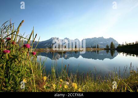 the Astberg reservoir near Going in Tirol is known as the 'mirror of the emperor' Stock Photo