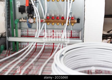 Main Control manifold of house floor heating system. Stock Photo