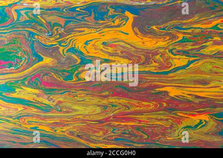 Liquid painting abstract texture. Colorful combination of bright colors. Stock Photo