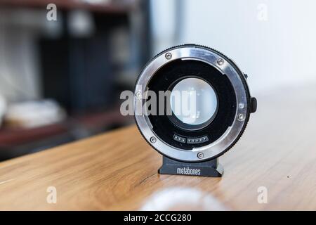 Metabones speedbooster close up Mounted between a mirrorless camera and a SLR lens. Increases maximum aperture. Optics designed by Caldwell Stock Photo