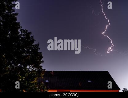 Storm with a lightning bolt in the sky Stock Photo