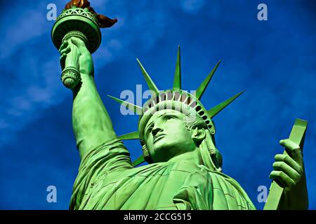 The Statue of Liberty is a colossal copper statue designed by Auguste Bartholdi a French sculptor was built by Gustave Eiffel.Dedicated on Oct 28, 188 Stock Photo
