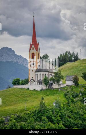 parish churc of Prato alla Drava-Winnebach in the municipality of  San Candido-Innichen, Val Pusteria-Pustertal, Bolzano, South Tyrol, Italy Stock Photo