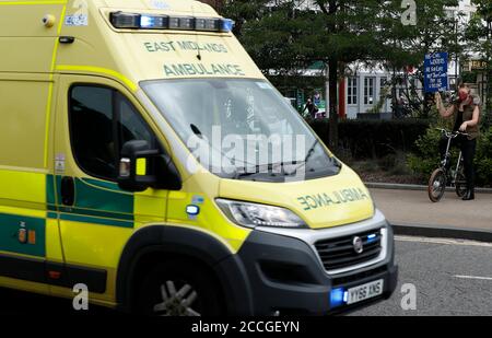 Leicester, Leicestershire, UK. 22nd August 2020. An ambulance is driven past a ÒSave Our NHSÓ protest. The campaign aims to build a movement to fight for fair wages in the National Health Service. Credit Darren Staples/Alamy Live News. Stock Photo