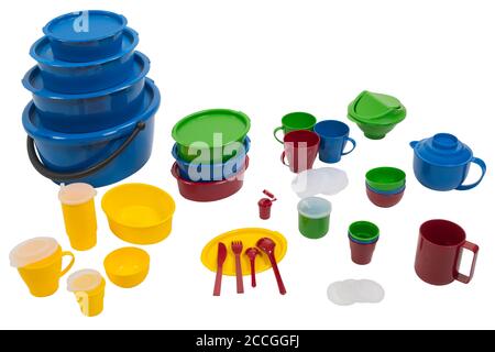 Dishes for food, sets of multi-colored plastic on a white isolated background Stock Photo