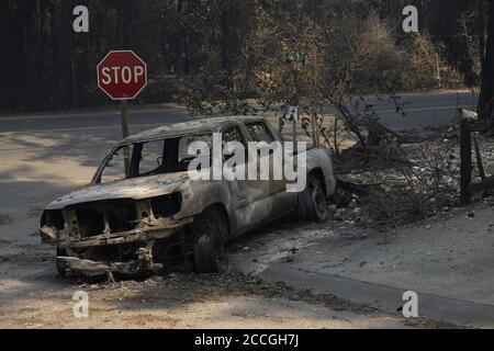 Boulder Creek, United States. 22nd Aug, 2020. The remains of a burnt vehicle in Boulder Creek, California as the CZU Lightning Complex fire continues to burn well into its fourth day with more than 50,000 acres torched, more than 100 structures destroyed and more than 75,000 people evacuated across two counties on Friday, August 21, 2020. Photo by Peter DaSilva/UPI Credit: UPI/Alamy Live News Stock Photo