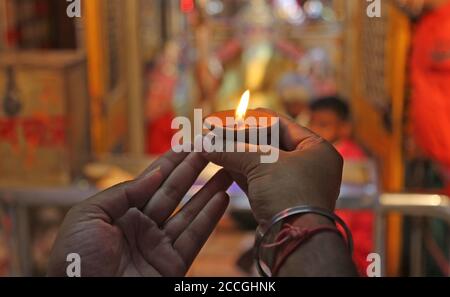 Beawar, Rajasthan, India, Aug 22, 2020: A devotee offers prayers at the Ganpati Temple on the occasion of Ganesh Chaturthi festival amid COVID-19, in Beawar. Credit: Sumit Saraswat/Alamy Live News Stock Photo