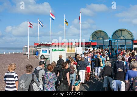 Passengers waiting for Ferry from Holwerd to Dutch island Ameland Stock Photo