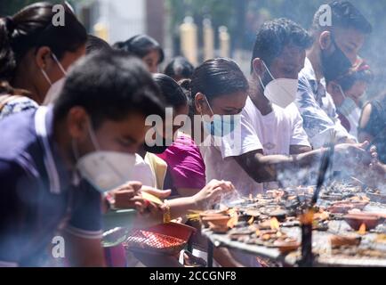 August 22, 2020, Guwahati, Assam, India: Devotees visit a Ganesh Temple wearing mask on the occasion of Ganesh Chaturthi festival, amid the ongoing coronavirus pandemic, in Guwahati. (Credit Image: © David Talukdar/ZUMA Wire) Stock Photo