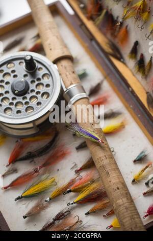 A collection of salmon flies in a fly box or reservoir, with a J.W. Young &  Sons 1540 salmon reel and a Bruce & Walker Norway salmon fly rod. Some of  Stock Photo - Alamy