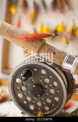 A collection of salmon flies in a fly box or reservoir, with a J.W. Young &  Sons 1540 salmon reel and a Bruce & Walker Norway salmon fly rod. Some of  Stock