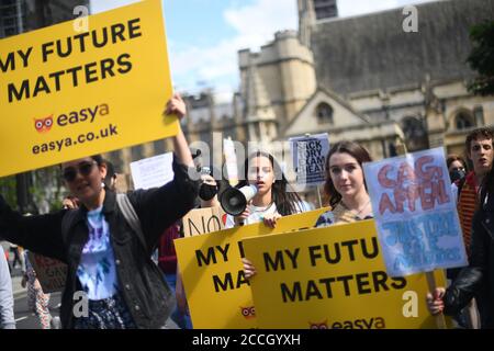 Students take part in a march from Marble Arch to the Department of Education in Westminster, London, calling for the resignation of Education Secretary Gavin Williamson over the government's handling of exam results after A-level and GCSE exams were cancelled due to the coronavirus outbreak. Stock Photo