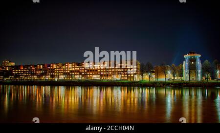 Maastricht, river Maas (The Netherlands) by night, nightphotography. Vieuw at Céramique and Bonnefantenmuseum. Stock Photo