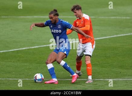 Everton's Dominic Calvert-Lewin (left) and Blackpool's Ethan Robson battle for the ball during the Preseason Friendly match at Bloomfield Road, Blackpool. Stock Photo