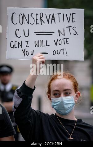 A-Level pupils protest opposite Downing Street against the decision to downgrade their results using a computer algorithm by the exam regulator Ofqual Stock Photo