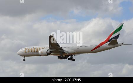 London, UK. 21 August 2020. Emirates Airline Boeing 777-300ER A6-EGD landing at Heathrow Airport. Stock Photo