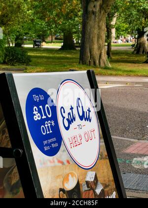 Poole, UK. 22nd Aug, 2020. Bournemouth, UK. Saturday 22 August 2020. A sign details the 'Eat Out to Help Out' goverment discount scheme to help restaurant businesses. Consumers can save up to £10 on Mon, Tues and Weds in August 2020. Credit: Thomas Faull/Alamy Live News Stock Photo