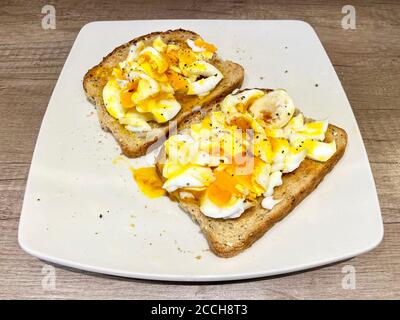 Soft boiled duck eggs on toast make a delicious meal Stock Photo