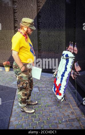 Vietnam Memorial, Washington, DC. A Veteran Contemplating Names of Fallen Veterans Inscribed on the Memorial. Stock Photo