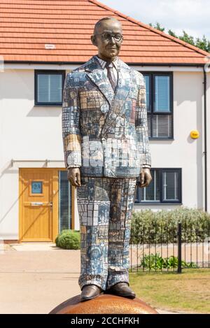 Statue of Eric Cole in housing estate on the site of the EKCO (from Eric Kirkham Cole Limited) British electronics company. Sculpture from mosaic tile Stock Photo