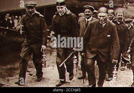 Wednesday 30 January 1929 - The then Prince of Wales (later King  Edward VIII and  Duke of Windsor) visiting the poverty stricken (due to unemployment)  Durham & Northumberland coal fields towns  of Winlaton, Blaydon, High Spen, Chopwell,Consett, Gateshead and Chester le Street. He is seen in this old photograph emerging from a mine carrying a miners lamp. He visited miners houses and even entered the house of Mr. Frank McKay, a 74 year old miner whose wife had just died and visited the room upstairs where Mrs. McKay lay dead.‘Taffy’ Lewis an out of work miner acted as guide through Winlaton Stock Photo