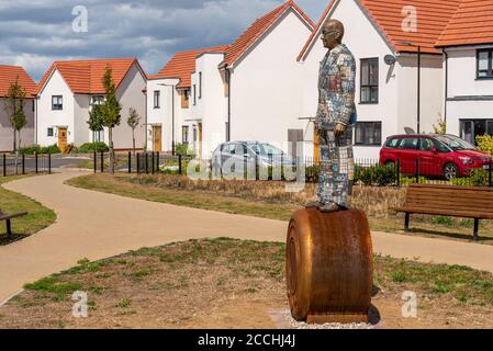 Statue of Eric Cole in housing estate on the site of the EKCO (from Eric Kirkham Cole Limited) British electronics company. Bellway Ekco Park homes Stock Photo