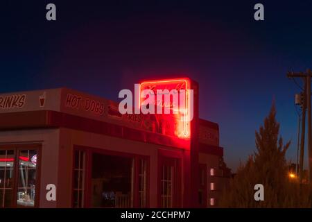 Clinton USA September 10 2015; Bright neon retro Route 66 Diner sign on building  at night Stock Photo