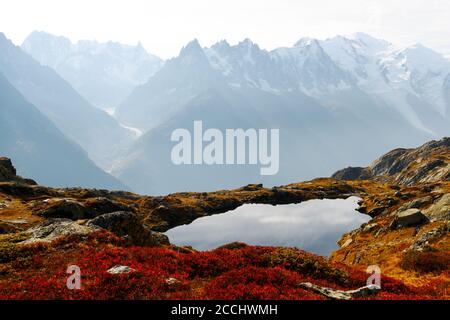 Colourful sunset on Chesery lake (Lac De Cheserys) in France Alps. Monte Bianco mountain range on background. Chamonix, Graian Alps. Landscape photography Stock Photo