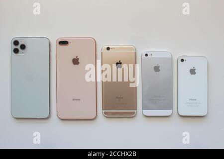 Calgary, Alberta, Canada. Aug 22, 2020. Several iPhone cameras back view on a white background. Stock Photo