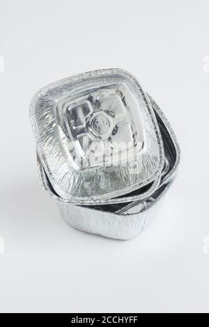 Clean, single use aluminum bowls,foil containers -take away package- on white background. Stock Photo