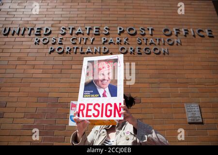 August 22, 2020, Portland, OREGON, USA: One hundred protesters gathered outside the Rose City Post Office during the Save the Post Office Saturday day of action organized by Moveon.org in Portland Oregon on Saturday, August 22, 2020. ''I'm a physician and many of my patients depend on the USPS for their medications. I'm desperately worried about what DeJoy has planned for our postal system, '' said COSGROVE. Protesters showed up at local post offices across the country to save the post office from President Trump and ask for the resignation of Postmaster General Louis DeJoy. (Credit Image: © K Stock Photo