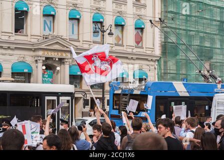 Saint Petersburg, Russia - August 22, 2020: people support democracy in Belarus waving with a white-red-white flag over Nevsky Prospect. Stock Photo