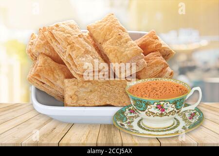indian khari or kharee or salty Puff Pastry Snacks, with tea, Khari bread Rusk, Puff Pastry Snacks, fresh square shaped puff pastry biscuit snacks wit Stock Photo