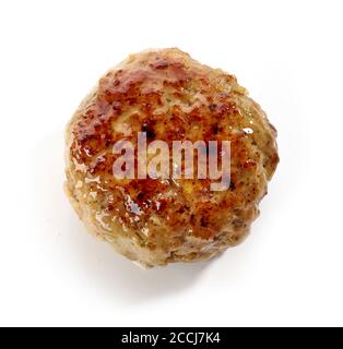 juicy homemade baked meat cutlet or meatball isolated on white background Stock Photo