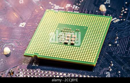 Modern processor CPU on the motherboard of the computer. The concept of technology hardware and repair Stock Photo