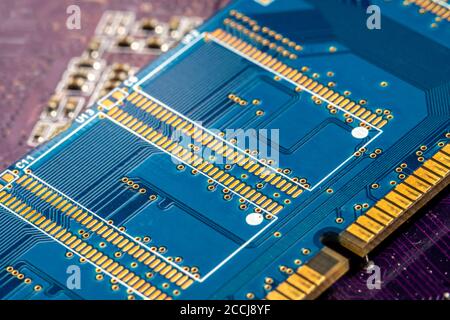 Electronic Board RAM with the lines and chips, semiconductor elements close up. The concept of the technology of solid-state microelectronics Stock Photo