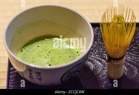 Ceremonial preparation and presentation of Japanese powdered green tea matcha, important part of Japanese culture Stock Photo