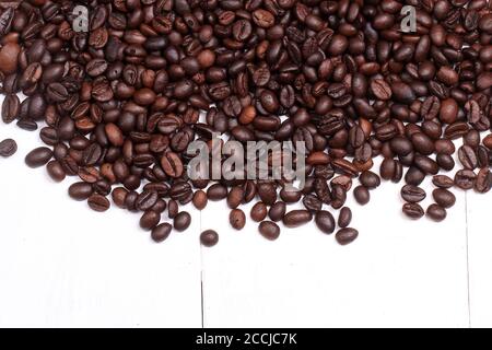 coffee beans on a white painted wooden plinth Stock Photo